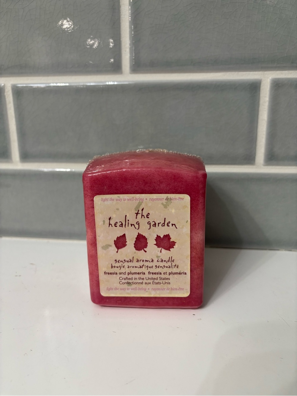 The Healing Garden by Coty in the freesia and plumeria scent